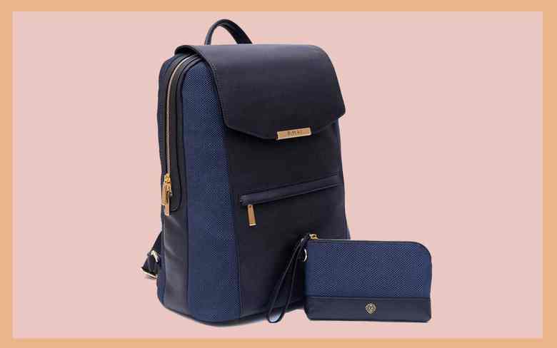 Hold your necessities organized in model with this glossy journey backpack